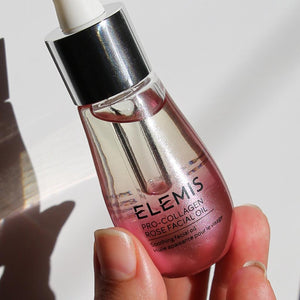 Elemis Pro-Collagen Rose Facial Oil hand hold